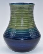 Moorcroft vase decorated with concentric circles, H14cm
