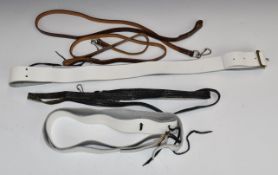 Two Makarov leather pistol straps or lanyards together with two English leather examples.