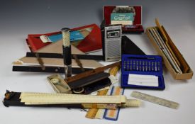 Draughtsman's instruments to include Otis King spiral slide rule, scale rules, Pelikan Graphos G2