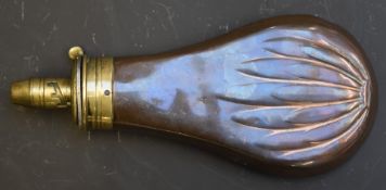 Sykes copper and brass powder flask with embossed leaf decoration to both sides, 18cm long.