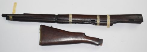 Short magazine Lee Enfield bolt-action rifle stock with storage compartment to the brass butt
