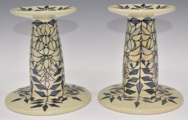 Dennis Chinaworks pair of signed limited edition no 1 and 2 of 26 lustre candlesticks decorated in