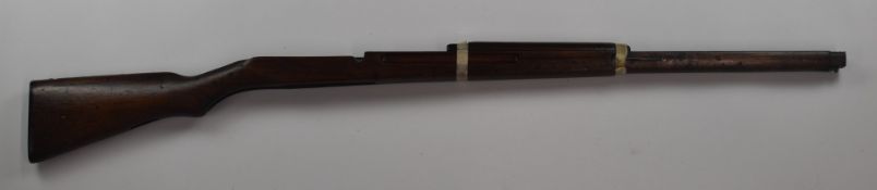 Japanese Arisaka bolt-action rifle stock with steel butt plate and mounts, 117.5cm long.