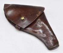 British brown leather pistol or revolver holster with brass fittings and 'CG' stamped either side of