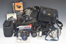 Cameras to include Minolta 7000 SLR with 28-85 1:3.5-4.5 and 80-200mm 1:4.5-5.6 lenses, Traveler