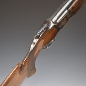 Miroku 12 bore over and under ejector shotgun with engraved lock, chequered semi-pistol grip and