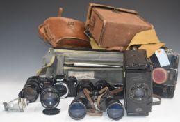 Ensign folding reflex model D camera in original case, CP Goerz plate camera and a Ricoh SLR