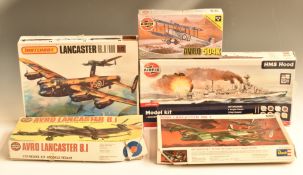 Five Airfix, Matchbox and Revell model aeroplane and ship kits comprising three Lancaster bombers,
