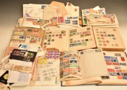 A collection of stamps and first day covers in albums including the Strand and loose including