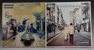 Oasis - Two albums comprising Definitely Maybe (CRELP169) records and cover appear Good, and (What's