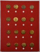 Sixteen vintage hunt/hunting buttons mounted on a felt covered display board comprising