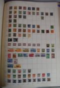 A large format stamp album (46 x 62cm) containing a world stamps collection ranges include Italy,
