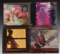 Approximately 70 albums including Fleetwood Mac, The Beatles, Creedence Clearwater Revival, Gerry