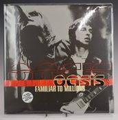 Oasis - Familiar To Millions (RKIDLP005). Records, cover and inners appear EX