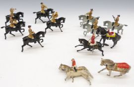 Twelve Britains Household Cavalry and similar lead soldiers.