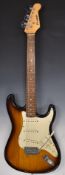 Westfield Stratocaster style electric guitar with Peavey Vypyr amplifier.