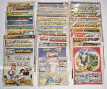 Thirty-eight Mickey Mouse comics dating from the 1930's to the 1950's.