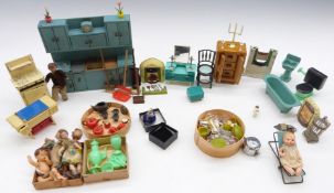 A collection of vintage metal, wooden and other doll's house furniture and accessories including