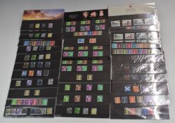 Eighty packs of GB definitive stamps including high value stamps, plus six greetings booklets