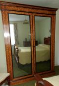Victorian satin birch and ebonised wardrobe with twin mirrored doors, currently dismantled,