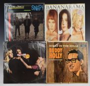 Approximately 100 albums including Genesis, Crystal Gayle, Jimi Hendrix, Elton John, Phil Collins,