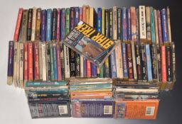 Ninety various Star Trek paperback books.