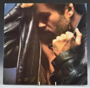 George Michael - Faith (4600001) with insert and Faith tour programme. Record appears EX, cover VG