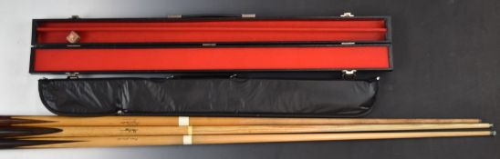 Three two-piece snooker cues all bearing facsimile signatures including Alex Higgins, Ray Reardon