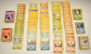 Approximately four hundred Pokémon cards comprising cards from Base, Jungle and Fossil sets.