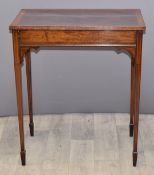 Edwardian inlaid mahogany and quarter veneered side table raised on tapering legs and spade feet,