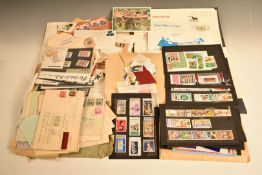 GB and world stamps loose in bags on envelopes and on pieces, GB first day covers etc