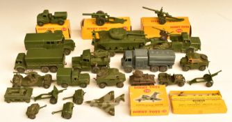 Twenty-three Dinky Toys and Dinky Supertoys diecast model military vehicles and guns including