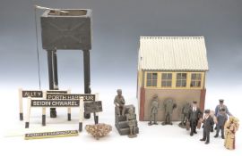 A selection of G scale garden railway accessories comprising signal box, working water tower for