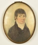 A portrait miniature of a young gentleman, in oval frame, maximum diameter 7cm