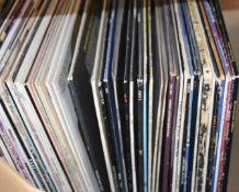 Approximately 60 albums including Michael Jackson, The Hollies, Simple Minds, Sade, Pet Shop Boys