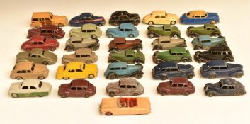 Thirty-one Dinky Toys diecast model cars including Austin Devon, Ford Sedan, Packard, Oldsmobile,