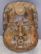 Large late 19th or early 20thC hand carved wooden 'Cachetone', Mexican folk art mask designed to