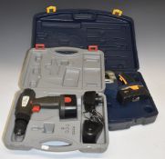 Cordless saw and a cordless drill, both in carry cases