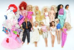 Eleven Mattel and Hasbro Barbie and similar dolls together with a selection of outfits and clothing.