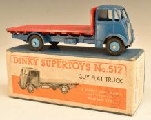 Dinky Supertoys diecast model Guy Flat Truck with red bed, dark blue cab and chassis and pale blue