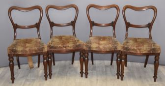 Set of four late Regency / Victorian balloon back dining chairs with serpentine front and sabre back