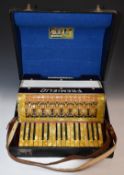 Fremielio piano accordion, 1930s German made 24 bass, in red marbled finish, original label to case,