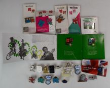 Twenty-three London 2012 Olympic Games pin badges.  Consigned directly by David Hemery CBE, a