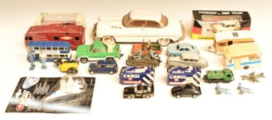Twenty-four Corgi Dinky and similar diecast and other model vehicles and accessories including
