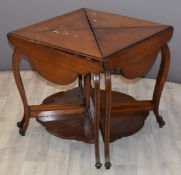 Late 19th or early 20thC occasional table with flaps, the four sections detaching to allow four