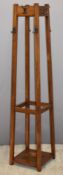 Oak coat/hat stand with stick or umbrella stand to centre, H173cm