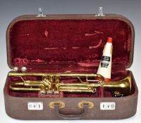 Melody Maker brass trumpet with Bach 351 5C and two further mouthpieces, in leatherette fitted case