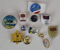 Twelve Olympic Games and Winter Olympics pin badges comprising Great Britain Sydney 2000, Beijing