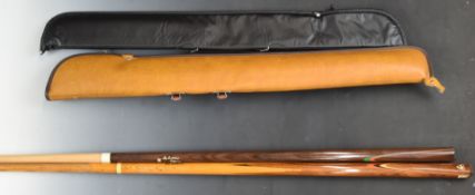 Two two-piece snooker cues bearing facsimile signatures for Alex 'Hurricane' Higgins and Joe Johnson