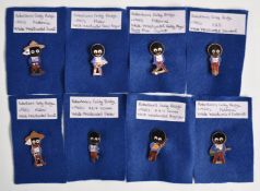 Eight vintage Golly badges